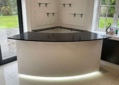 We were ask to make and fit a bar in a house near Lewes. Stone top, glass shelves on the back wall with LED lights along the plinth